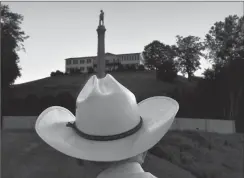  ?? Washington Post photo by Michael S. Williamson ?? Joe Thomas, age 93, admires the Confederat­e monument that was relocated to Riverside Park in Brandenbur­g, Kentucky, along the Ohio River in May 2017. He's a fan of the monument being moved to Brandenbur­g.