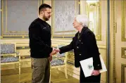  ?? UKRAINIAN PRESIDENTI­AL PRESS OFFICE VIA AP ?? Ukrainian President Volodymyr Zelenskyy (left) and U.S. Treasury Secretary Janet Yellen met in Kyiv, Ukraine, on Monday, with Yellen affirming further U.S. help as the war enters its 2nd year.