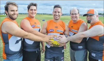  ?? T.J. COLELLO/CAPE BRETON POST ?? Chris Bourque of Sydney River will play for Canada at the 2017 Australian Football League Internatio­nal Cup in Melbourne, Australia, Aug. 5-19. Shown are Sydney Giants players, from left, Eric Martin of Sydney Mines, Nowell Sharpe of Howie Centre,...
