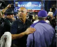  ?? ROSS D. FRANKLIN — THE ASSOCIATED PRESS FILE ?? Penn State head coach James Franklin, front left, greets Washington head coach Chris Petersen, right, after the Fiesta Bowl on Dec. 30 in Glendale, Ariz.