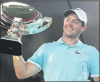  ??  ?? TIMELY: Rory McIlroy shows off the FedEx Cup