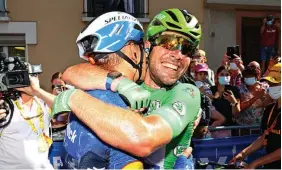  ?? Photo / Getty Images ?? Mark Cavendish celebrates in the sprinter’s green jersey.