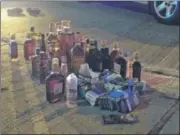  ?? DESMOND WINTON-FINKLEA / STAFF ?? Police said they recovered a large amount of alcohol and cigarettes after a multi-county pursuit on I-75 that ended in Dayton.