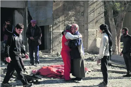  ?? Ameer Al Halbi / AFP ?? Grief and horror after more air raids in east Aleppo. At least 27 people were killed and hospitals were destroyed.