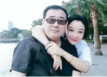  ?? PHOTO FROM CHONGYI FENG VIA AP ?? IN HAPPIER TIMES
Chinese-Australian writer Yang Jun (left) and his wife Yuan Xiaoliang are at an undisclose­d location in this undated picture.