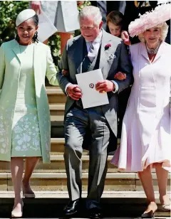  ??  ?? Top: Yesterday’s interview. Above: Doria, Charles and Camilla at the wedding. Right: Meghan and her father