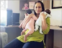  ??  ?? New mom Swastika Sirohi is on double duty with her special ‘twins’ born four months apart.