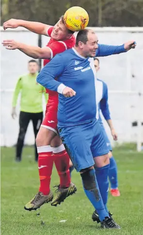  ??  ?? Eastwood Hanley and Halmerend battle for the ball on Sunday.