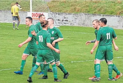  ?? Picture: John Laing. ?? Thornton Hibs celebrate one of their goals in the victory over Whitburn that took them to the top of the table.