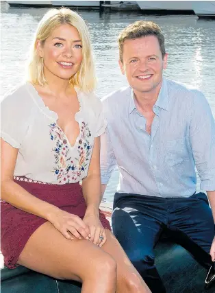  ?? Pictures: JOEL ANDERSON/ITV, TIM MERRY ?? This Morning host Holly Willoughby settles into presenting I’m a Celebrity with Declan Donnelly, lounging on a boat and in front of the cameras in the jungle