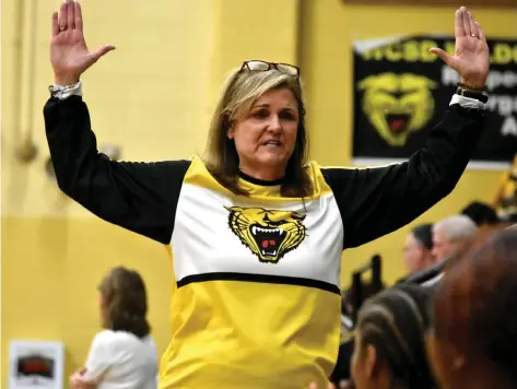  ?? (Pine Bluff Commercial/I.C. Murrell) ?? Leslie Henderson of Watson Chapel gives instructio­ns to her team during a Feb. 9 home victory against Star City.