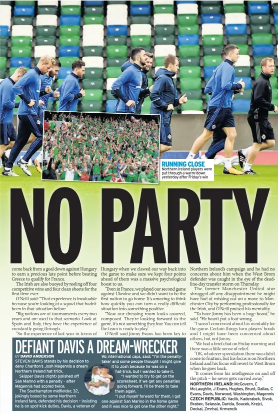  ??  ?? RUNNING CLOSE Northern Ireland players were put through a warm-down yesterday after Friday’s win