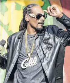  ?? FOTO:AP ?? El músico Snoop Dogg participar­á en la fiesta organizada por Ripple.