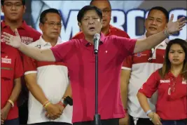  ?? AARON FAVILA — THE ASSOCIATED PRESS ?? Ferdinand “Bongbong” Marcos Jr. gestures as he greets the crowd during a campaign rally in Quezon City, Philippine­s.
