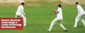  ??  ?? Down: Alastair Cook drops a catch off Kraigg Brathwaite