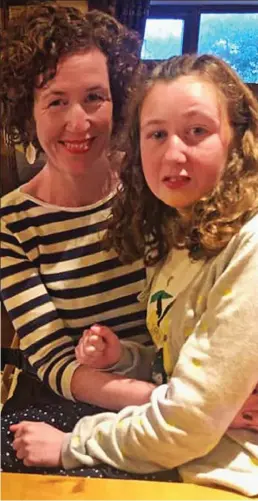  ??  ?? Grieving: Nóra, right, with her Belfast-born mother Meabh