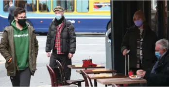  ??  ?? Blue Monday: People eat outside in the cold at a restaurant in Dublin yesterday