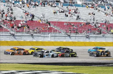  ?? Richard Brian ?? Drivers compete Sunday in the NASCAR Cup Series South Point 400 race at Las Vegas Motor Speedway. The crowd was estimated at 45,000.Las Vegas Review-journal