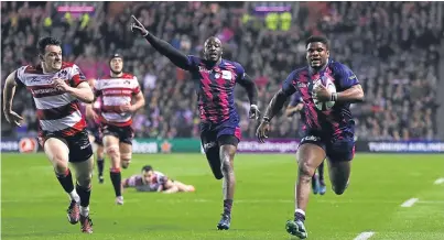  ?? Pictures: Getty. ?? Left: Stade Francais celebrate their European Challenge Cup triumph at the fifth attempt. Top: Gloucester’s Jonny May breaks away to score the first try of the game. Above: Jonathan Danty of Stade Francais runs in his team’s second try.