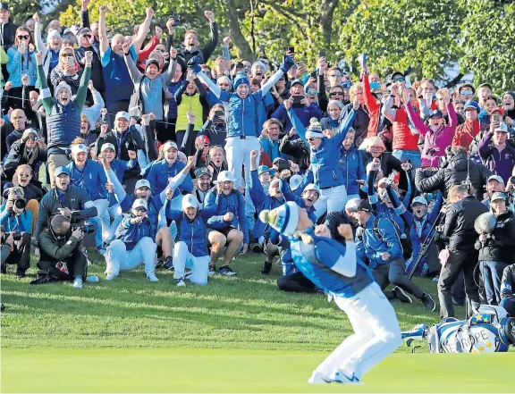  ?? Picture: Getty Images. ?? It all led to THIS moment: Europe celebrates as Suzann Pettersen holes the winning putt at Gleneagles.