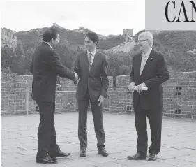  ?? ADRIAN WYLD / THE CANADIAN PRESS ?? Prime Minister Justin Trudeau and Guy Saint-Jacques, then-ambassador to China, right, meet with Luo Zhaohui, China’s ambassador to Canada, at the Great Wall last year.