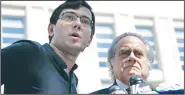  ?? AP/SETH WENIG ?? Martin Shkreli (left) talks with reporters Friday while standing next to his attorney Benjamin Brafman after leaving federal court in New York.