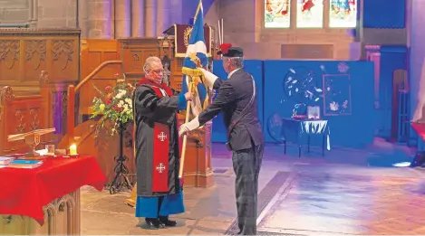 ?? Pictures: Kim Cessford. ?? The Rev Roderick Grahame and standard bearer Brian Smith in Brechin Cathedral.