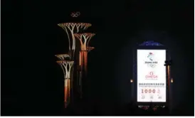  ?? TAN XIAOFENG / FOR CHINA DAILY ?? Beijing kicks off the 1,000-day countdown on a giant clock located near the Bird’s Nest stadium on May 10, 2019.