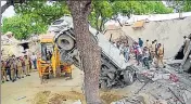  ?? PTI ?? An earthmover removes the mangled remains of a car during the demolition of Vikay Dubey’s residence in Kanpur Dehat district. ■