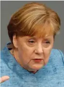  ?? FOTO: HANNIBAL HANSCHKE / REUTERS /NTB SCANPIX ?? Tyske kommentato­rer tror at korrupsjon­sskandalen i det tyske UDI kan ramme forbundska­nsler Angela Merkel.