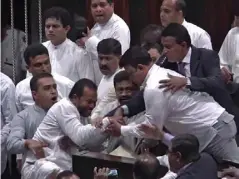  ?? (AP) ?? Violent scenes erupted in parliament last week