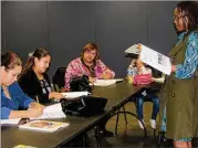  ??  ?? Johanne Jean (right), director of the La Amistad English for Successful Living, is part of a team of instructor­s that offers English language classes to adults.