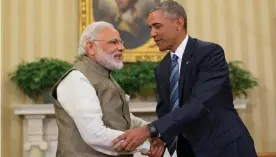  ??  ?? Prime Minister Narendra Modi and US President Barack Obama shake hands in the Oval Office of the White House in Washington on Tuesday.