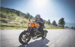  ?? HARLEY-DAVIDSON MOTOR CO. VIA REUTERS ?? Harley-Davidson’s new electric motorcycle, LiveWire, is facing an uphill climb as its
target audience of younger riders finds the machines expensive, dealers say.