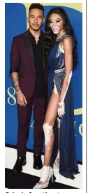  ??  ?? Calm before the storm: Lewis Hamilton and Canadian model Winnie Harlow arrive at the CFDA Fashion Awards at the Brooklyn Museum on Monday. — AP