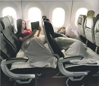  ?? Air New Zealand ?? AIR NEW ZEALAND’S Skycouch is three seats that can turn into a bed. You must pay for all three.