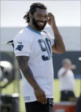  ?? CHUCK BURTON— ASSOCIATED PRESS ?? In this July 28 file photo, the Panthers’ Julius Peppers smiles during a practice at the team’s training camp in Spartanbur­g, S.C.