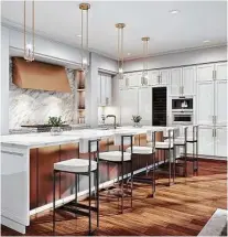  ?? Photo courtesy of Sudhoff Companies ?? High-end finishes are apparent in kitchens at The Sophie.