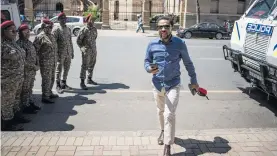  ??  ?? THERE FOR JULIUS. Economic Freedom Fighters spokespers­on Mbuyiseni Ndlozi arrives at court in Pretoria yesterday.