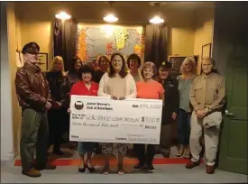  ?? SUBMITTED PHOTO ?? Members of the Boyertown Junior Woman’s Club present a check for $9,010to the General Carl Spaatz National USAAF Museum.