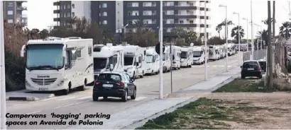  ??  ?? Campervans 'hogging' parking spaces on Avenida de Polonia