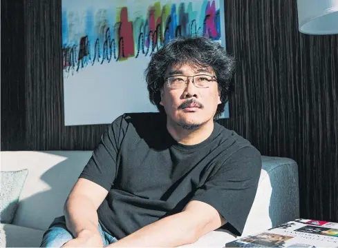  ??  ?? WILD IDEA: Bong Joon Ho, director of ‘Okja’, a fable about meat eating and a geneticall­y engineered animal, has angered theatre owners for launching on Netflix on its release date.