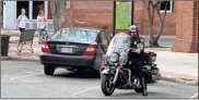  ?? Doug Walker ?? Rome Police Pfc. Ricky Mills monitors traffic in the 400 block. Romans can look for a greater presence downtown.