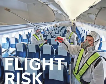  ?? ASSOCIATED PRESS ?? Workers wearing protective gear spray antiseptic solution in an airplane amid rising public concerns over the spread of MERS, Middle East Respirator­y Syndrome, at Incheon Internatio­nal Airport in Incheon, South Korea, in June 2015. A 2015 GAO report...