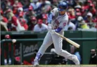  ?? THE ASSOCIATED PRESS ?? New York Mets’ Michael Conforto hits into a double play during his at-bat against the Washington Nationals in the third inning of home opener baseball game, at Nationals Park in Washington, Thursday.