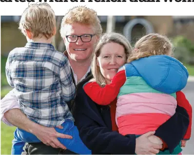  ?? ?? Safely home... at last: Hugo with his wife Jo and children Harry, six, and Georgie, four