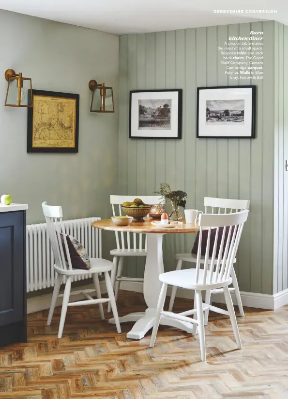  ??  ?? Barn kitchen/diner A circular table makes the most of a small space. Bespoke table and stick back chairs, The Good Shelf Company. Camaro Cambridge parquet, Polyflor. Walls in Blue Gray, Farrow & Ball