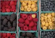  ?? PHOTO BY SARAH REINGEWIRT­Z/PASADENA STAR-NEWS ?? In this file photo, New Era Farms’ berries are on sale during the last San Marino farmers’ market.