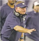  ?? GREGORY BULL/ASSOCIATED PRESS FILE PHOTO ?? Coach Brian Kelly has Notre Dame in the College Football Playoff for the first time. For the other three teams, it’s a return trip.