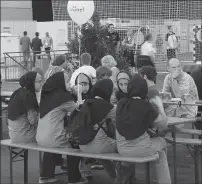  ?? Photo courtesy of wikimediac­ommons.com ?? Iranian students take a break during a robotics competitio­n in Tehran, Iran. Universiti­es in the U.S. say President Donald Trump's revised travel ban would block hundreds of graduate students who play key roles in research.